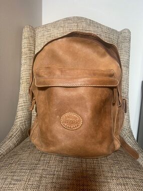 Roots Brown Leather Backpack 12 L 18 H 6 depth great shape leather is amazing